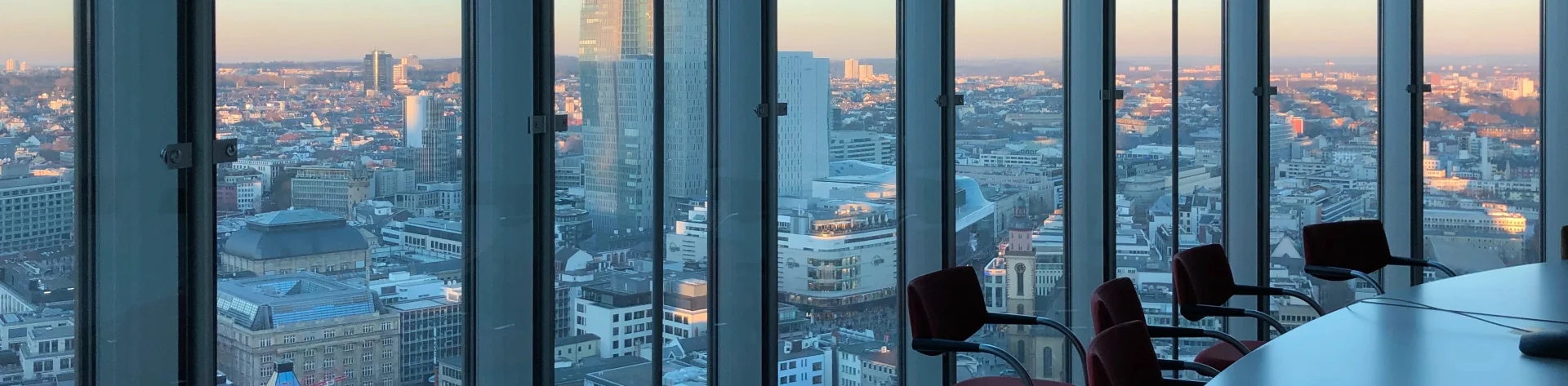 Conference room with panoramic windows and city view