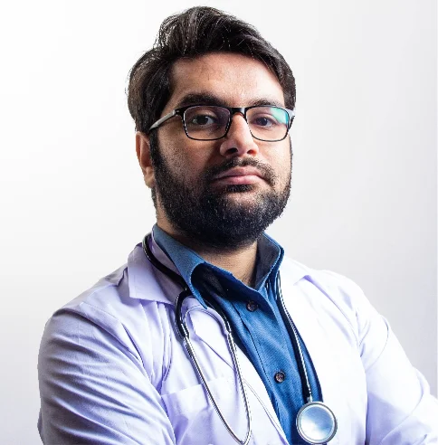 Confident male doctor with a beard.